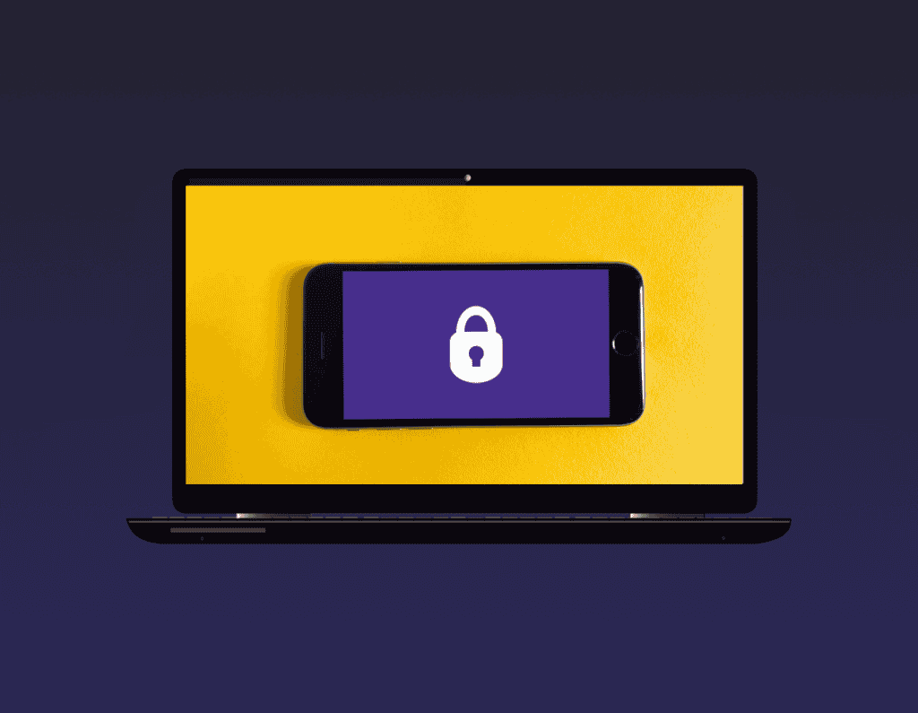 opened laptop showing a phone that has an image of lock in the middle on its screen