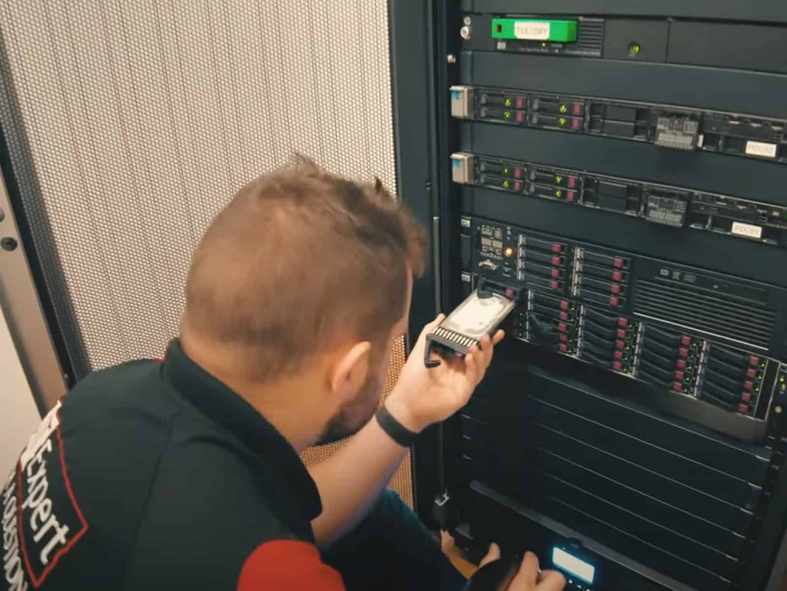 Trucell engineer fixing a server